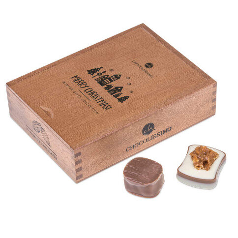 wooden chocolate box with pralines, Christmas chocolate pralines