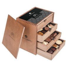 hand made pralines in wooden boxes